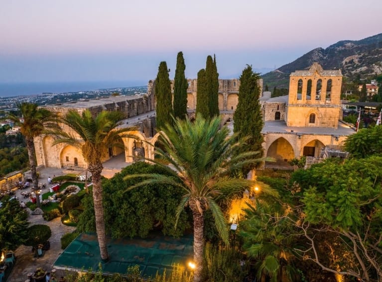 Bellapais Abbey below the Five Finger Mountains at dusk