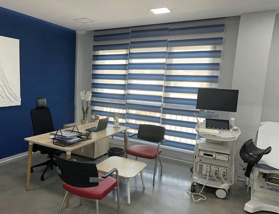A consultation and ultrasound room at SAGA Clinic